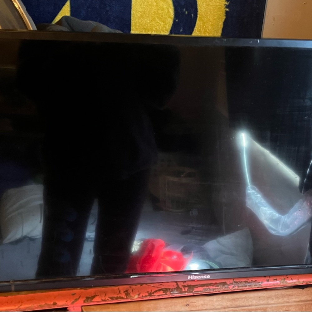 Hisense roku tv. With wall mount. 28in by 16in